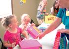 Madison and Ellen Timmerman, and Kylie Slotke finished their travel cases project at Vacation Bible School.