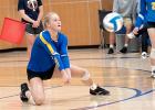 McKenzie Tolk digs the ball for the Vikings.