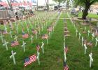 Flags and crosses fill Veterans Park during Memorial Day service each year. 
