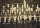1948-49 Minneota boys' basketball team. Front row, left to right: Ambros Johnson, Donovan Roberg, Gene DeSutter, Donald Kjorness, Virgil Gislason, Chuck Friend, Allan Josephson, Earl McMillin. Back row, left to right: Richard Tillemans (student manager), Coach Robert Kafka, Dennis Johnson, Donald Hanson, Anton Fier, Ronald DeSutter, Superintendent Peters, Leo Fox (student manager).