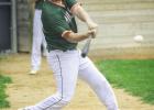 Austin DeVlaeminck of the Minneota Mudhens delivers a double as one of his five hits on the afternoon against Ortonville. 
