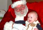 Carson Farrel, 5 months, of Minneota showed his joy at meeting Santa Claus for the first time at the annual North Pole Extravaganza in Minneota on Saturday.  Santa arrived in the morning in a Minneota Fire Department truck.