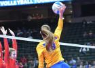Natalee Rolbiecki delivered one of her kills to the Ada-Borup side of the net.