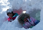 Laney Coequyt (left) and Bentley Walerius (right) found time to build a snow fort after the 15 inches of snow that fell on Saturday night into Sunday. 