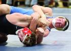 Shawn Buysse (top), who won two matches at Browerville, had a nice hold on his opponent.