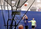 Viking senior Grady Moorse took a shot with teammate Alex Saltzer watching. 