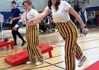 Kiersyn Hulzebos, left,  and SnoBall Queen Dakota Pesch competed in the 56-team bean bag tournament during SnoBall Festivities last week.
