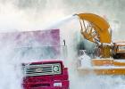 Winds were still blowing as the crew tried to clean up the streets.