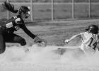 McKenzie Bednarek of Minneota/Canby safely steals third base against Dawson-Boyd. 