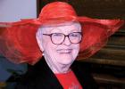 Lona Stensrud was all smiles in her red hat. 