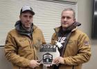 Minneota Fire Chief Jeff Sussner, right, receives the Minneota Fire Fighter of the Year Award from last year’s recipient, Shane Rieder.