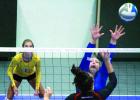 Staff Sydney Larson met the opposition at the net.