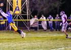 Thomas Hennen leaped for a long reception from brother Jacob.