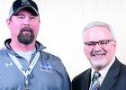 Minneota’s Tim DeVlaeminck (left) received the certificate of commendation from John Linc Stine. 