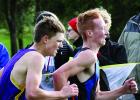 Jalyn Ufkin of Canby-Minneota just got past Bryce Nelson of Montevideo at the finish line to place 13th in the meet at Granite Falls on Thursday. 