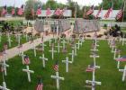  Veterans Park in Minneota was a sea of red, white and blue with American flags on each of the 286 white crosses that represented deceased veterans from the area, and 34 gold crosses representing area soldiers who were killed in action. Despite the COVID-19 pandemic keeping a few people away, the Memorial Day “Light a Light” ceremony was well attended on a mild evening. 