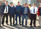These local veterans spent last Tuesday afternoon properly disposing of discarded flags in a ceremony behind the American Legion building in Minneota. Left to right: Bruce Novotny, Jerry Kloos, Dave Hennen, Harold DeSmet, Ed Lozinski, Bob Myhre, and Jim Fink. 