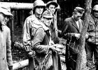 Virgil Ufkin  was a soldier with prisoners of war (back, second from left) during World War II.