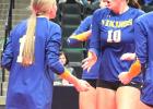 Libby Sussner, left, and Leah Coequyt celebrate a point in the quarterfinal win against Ely on Thursday.