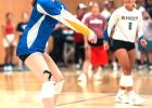 Madison Minnehan of Minneota passes up to a setter during a match last Tuesday night against Rocori.