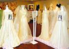 A new wedding collection exhibit features over 40 wedding dresses from county brides. 