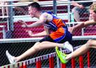 Carter Wente crosses the hurdle.