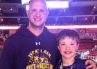 Ryder Laleman, right, the son of 2000 Minneota graduates Tim, left, and Alyssa Laleman of Rock Rapids, Iowa, placed third at the Northwest District Individual Wrestling Tournament. Tim is the coach of the AAU team from Rock Rapids. Ryder is also the grandson of Jim and Andrea Opdahl and Ed and Bonnie Laleman of Minneota.